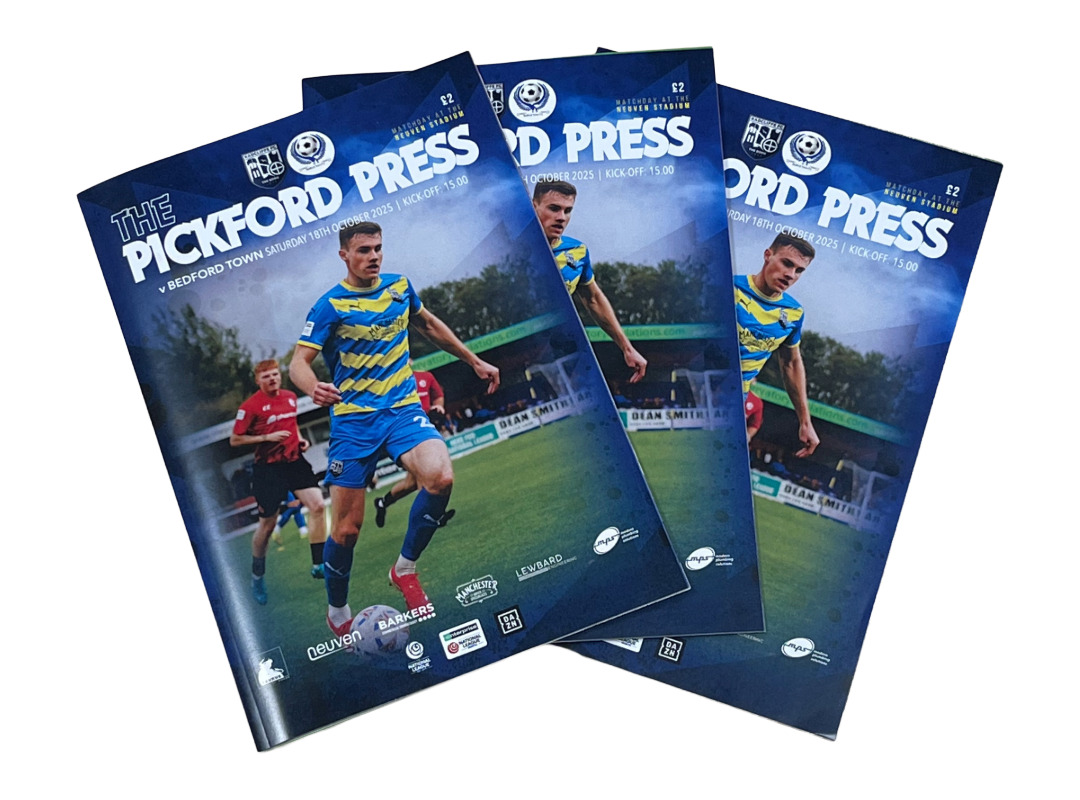 Radcliffe Football Club matchday programme with an image of a football player on the front cover