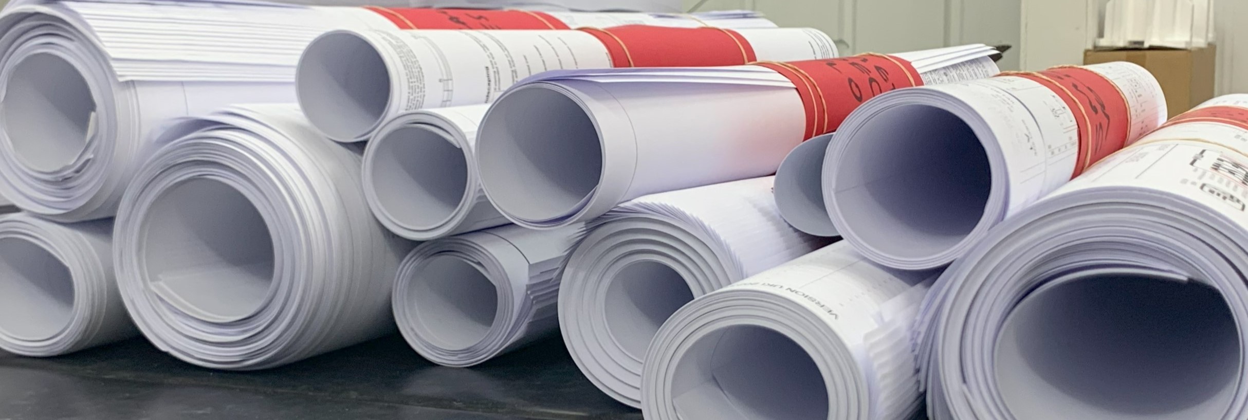 Rolls of plan printing used to design production sets