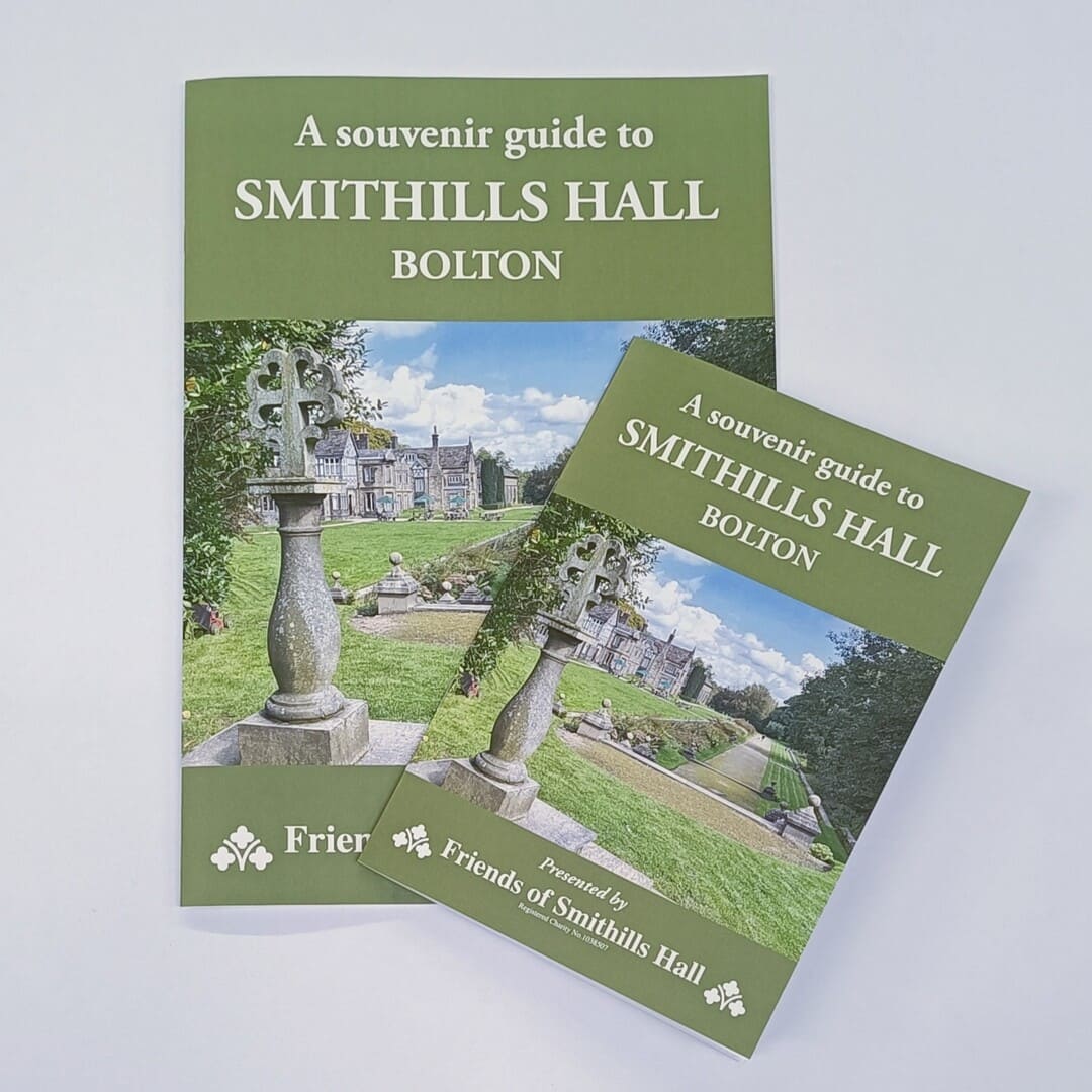 A green souvenir brochure for Smithills Hall, with an image of Smithills Hall manor house and gardens
